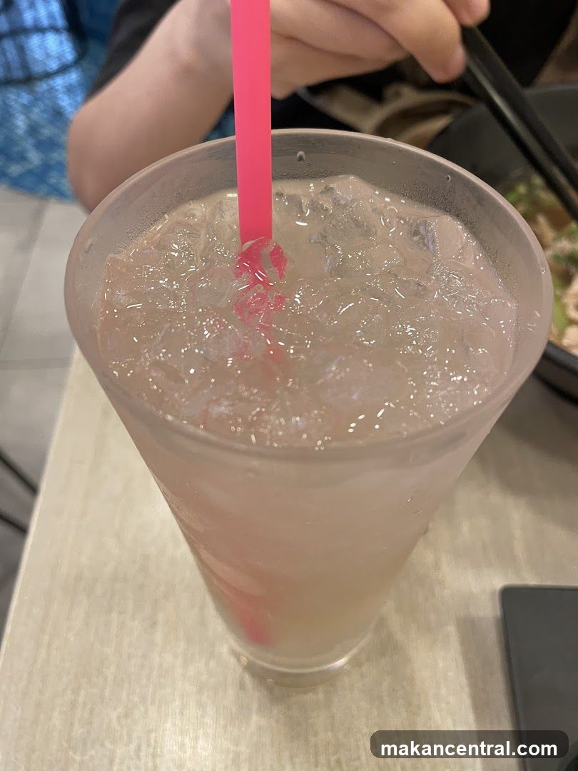 Iced Drink with Pink Straw