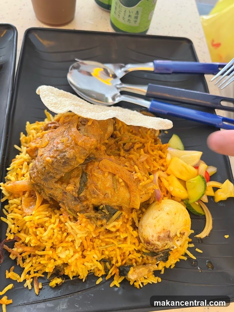 Chicken Biryani with Egg and Salad