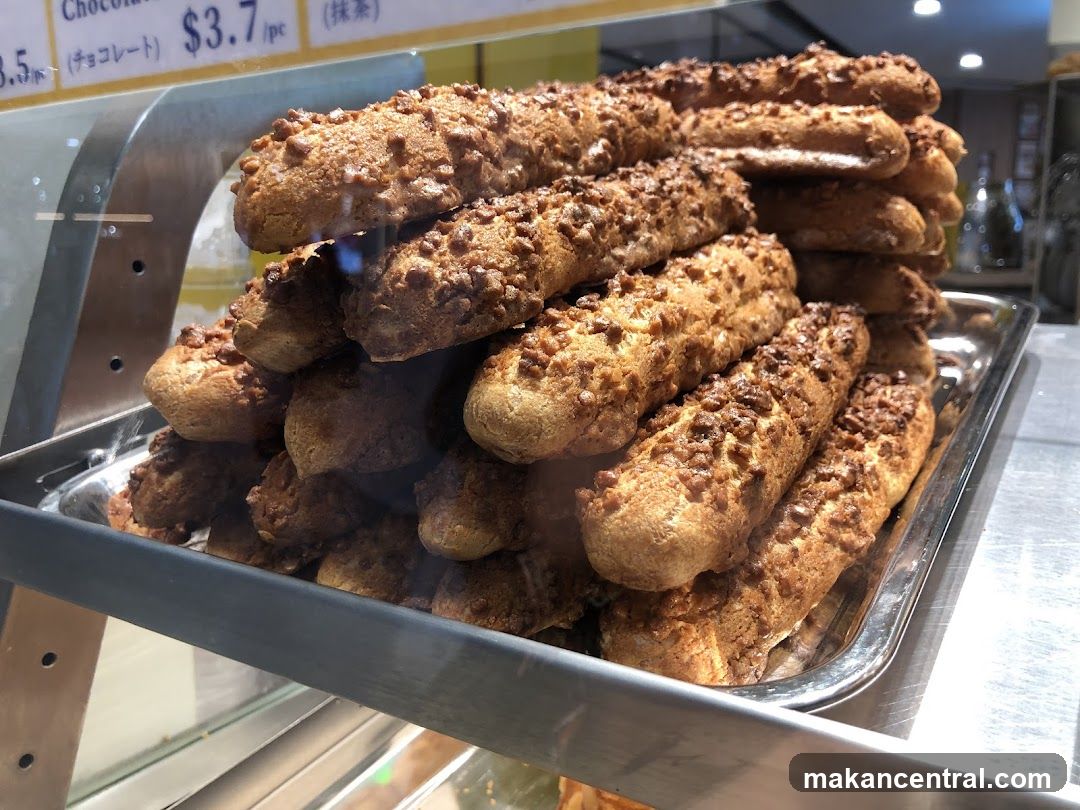 Eclairs in a Display Case