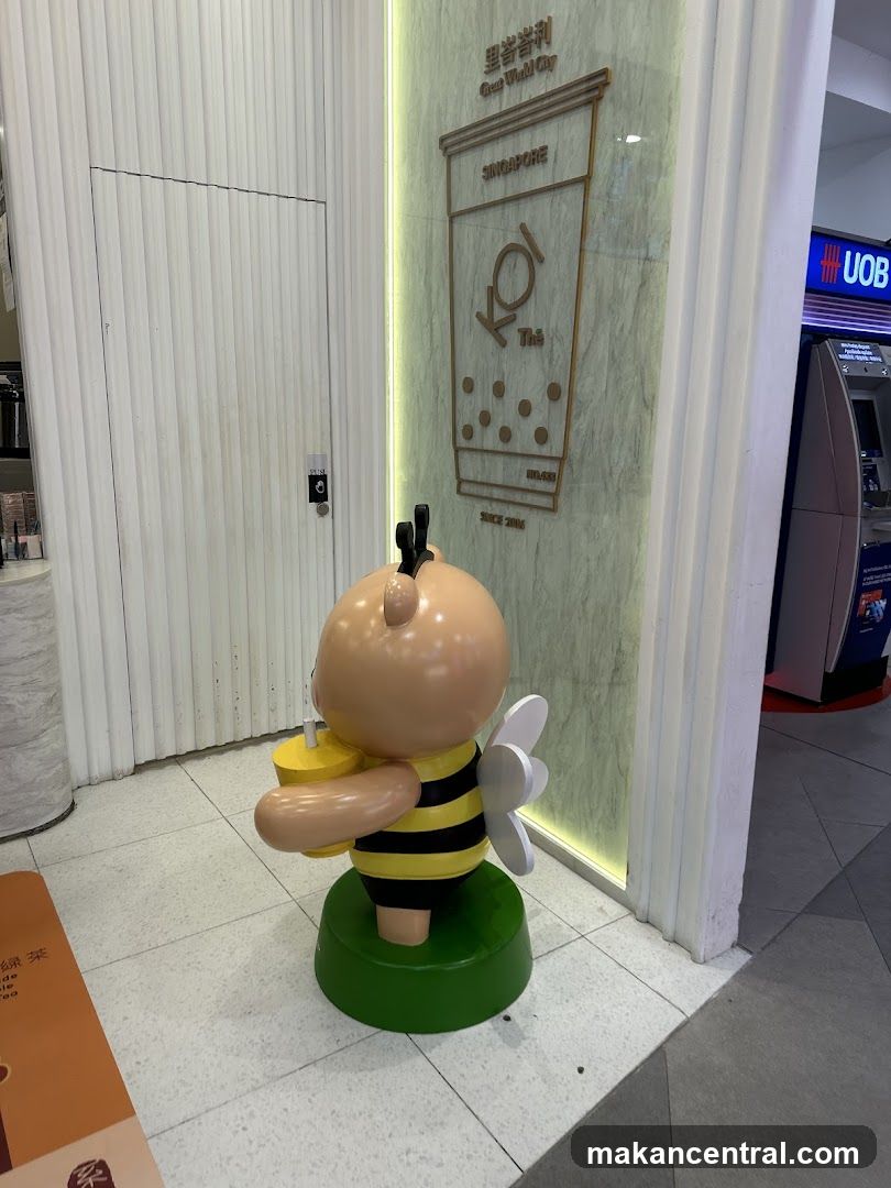 KOI Thé Mascot and Signage