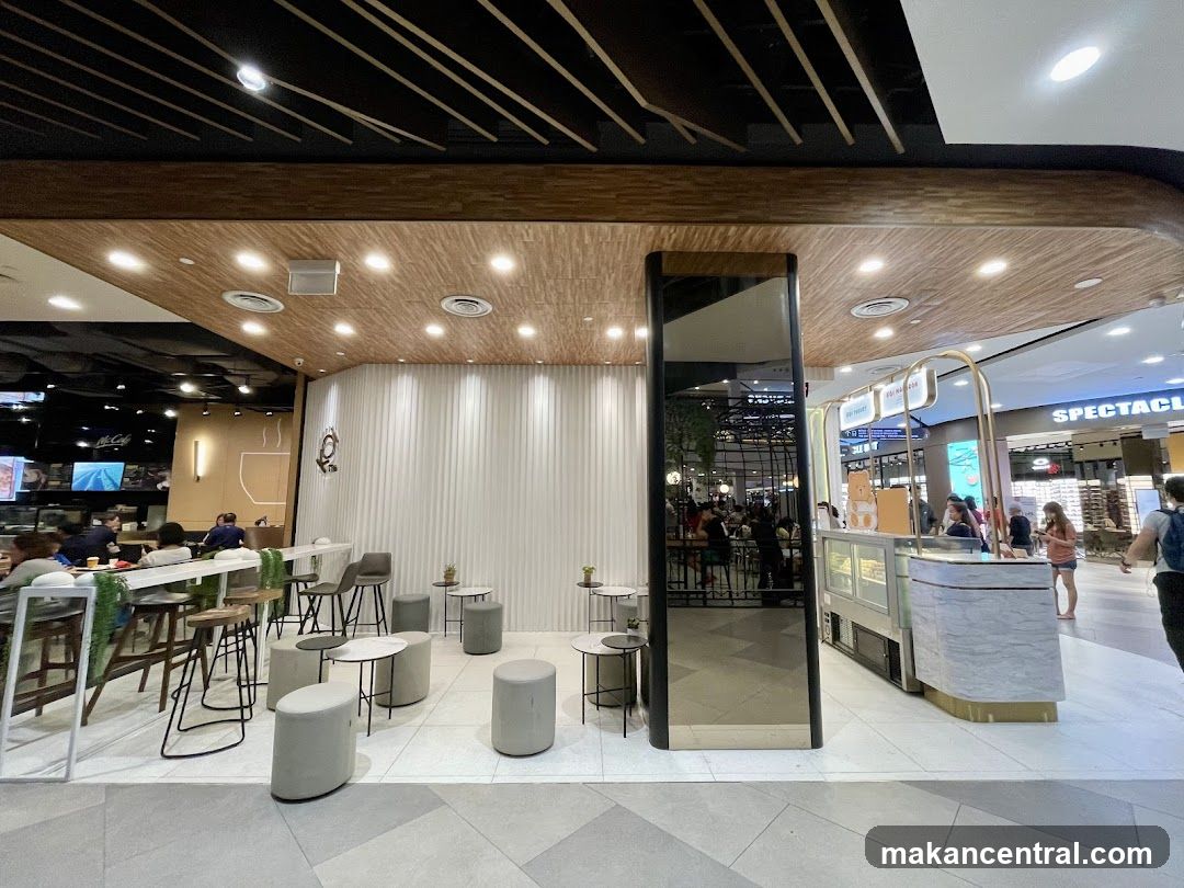 Cafe Interior with Seating and Display Counter