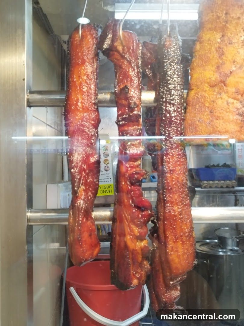 Roasted Meats Hanging in Display