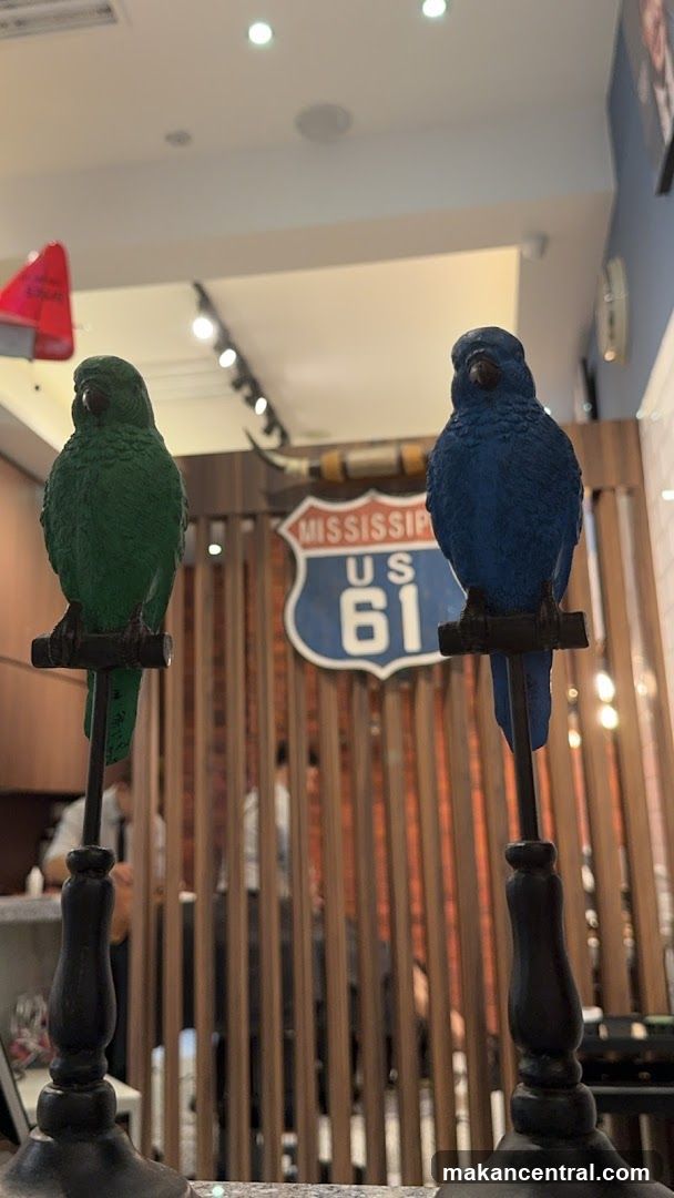 Interior Decor with Parrot Statues and Road Signage