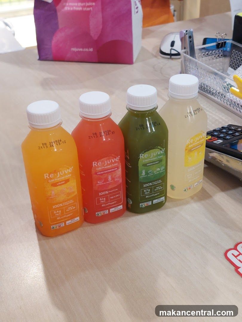 Four bottles of Re-juve cold-pressed juice