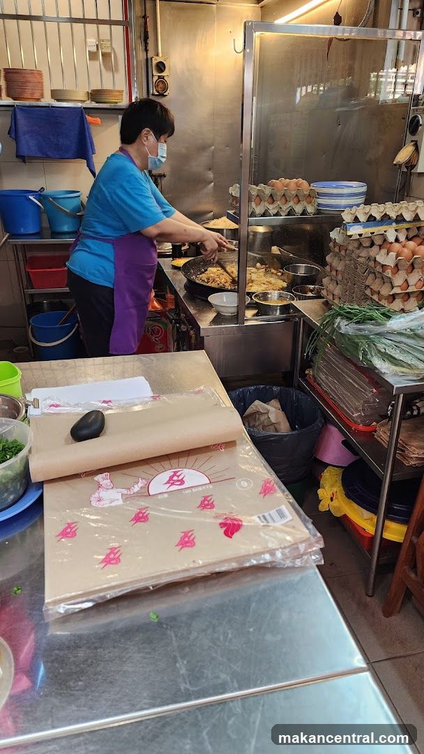 Cook preparing food in a kitchen