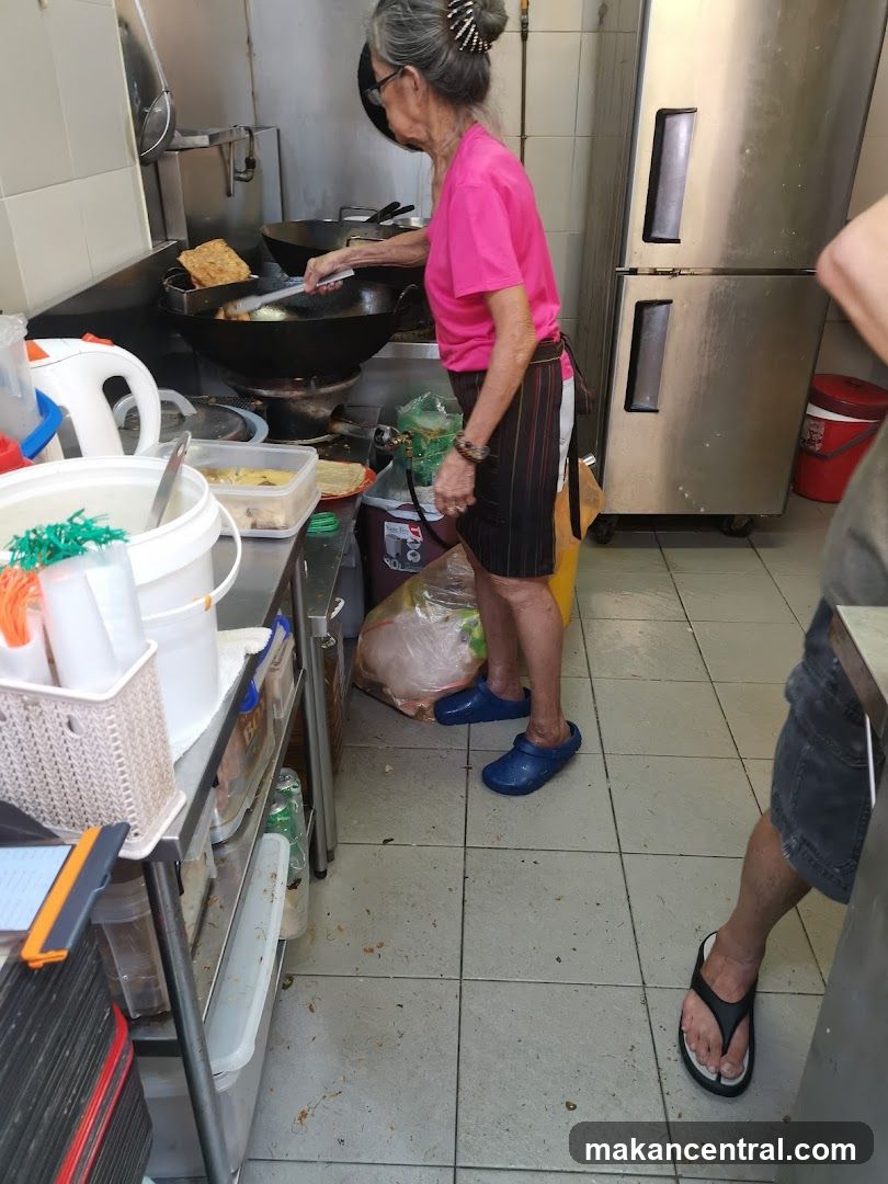 Elderly Woman Cooking