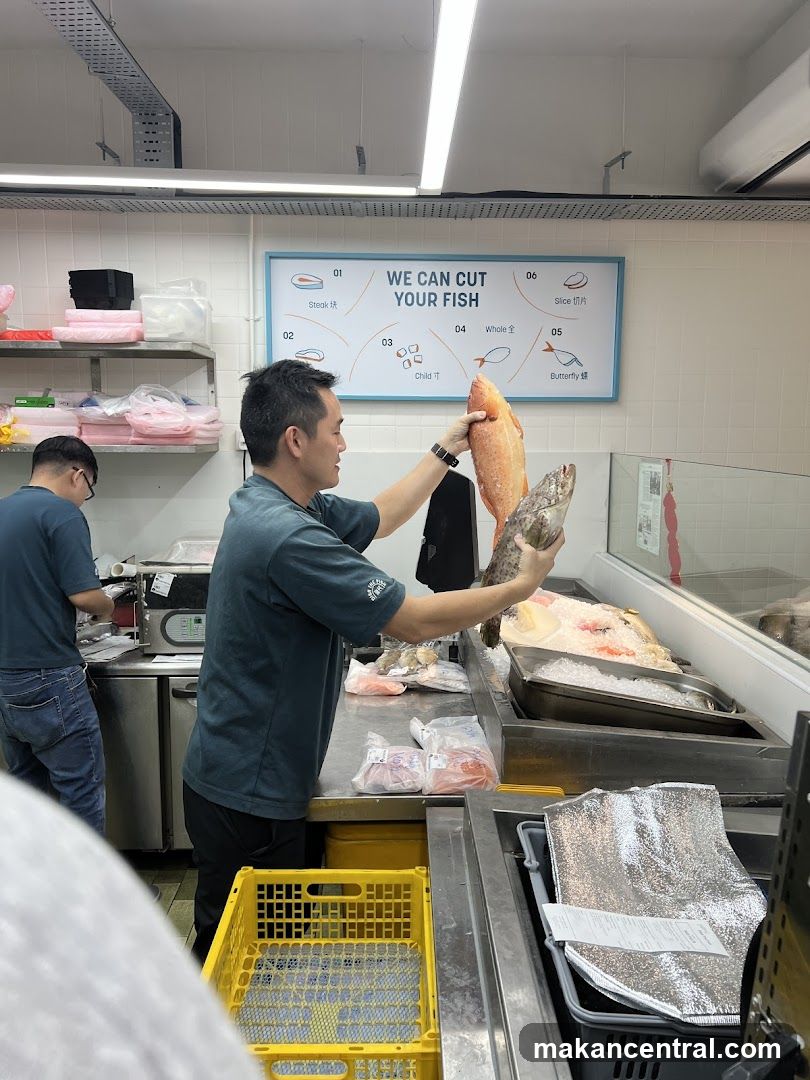 Fishmonger preparing fish