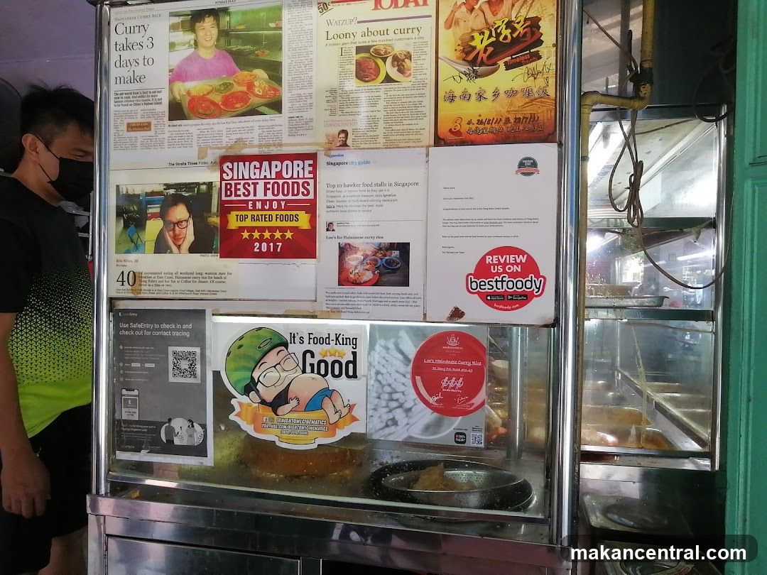 Food stall with promotional posters