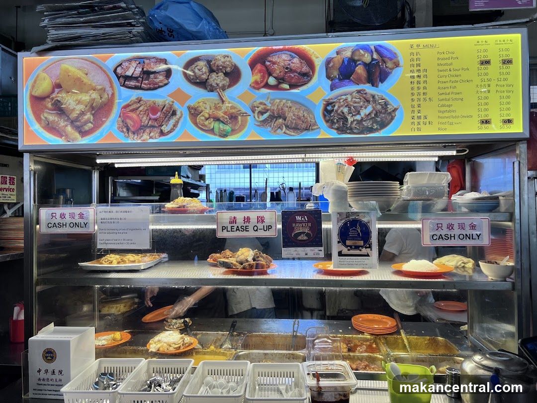 Food stall interior with display case and signage