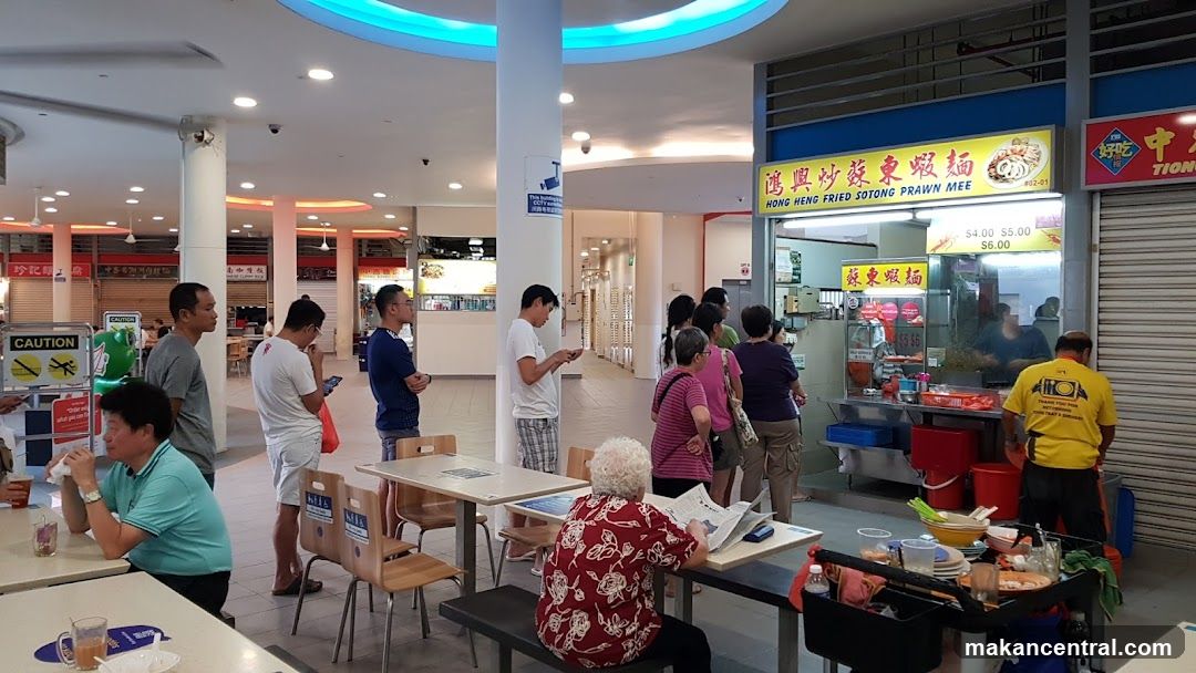 Food court interior with customers and stall