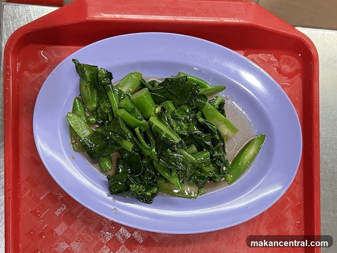 Stir-fried greens on a tray