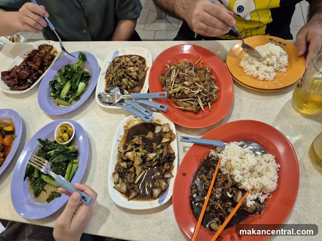 Dining table with assorted dishes