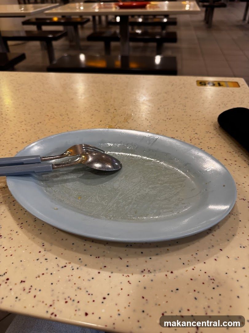 Empty Plate at Dining Table