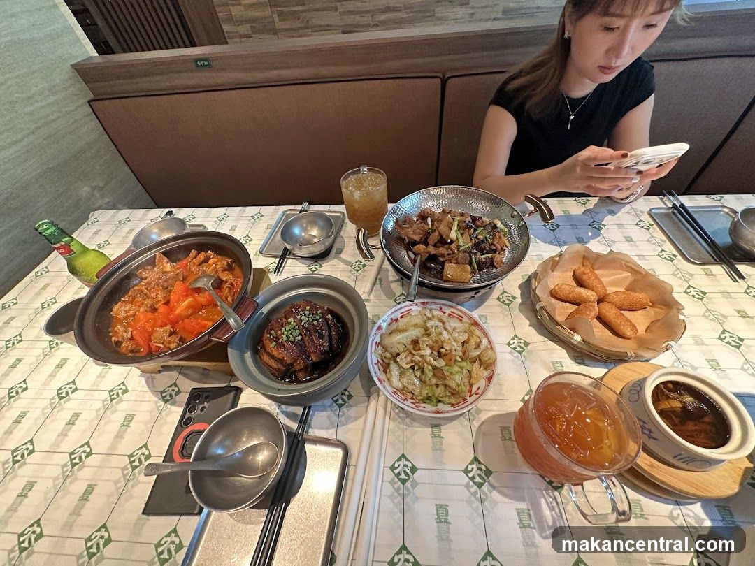 Dining Table with Food and a Person
