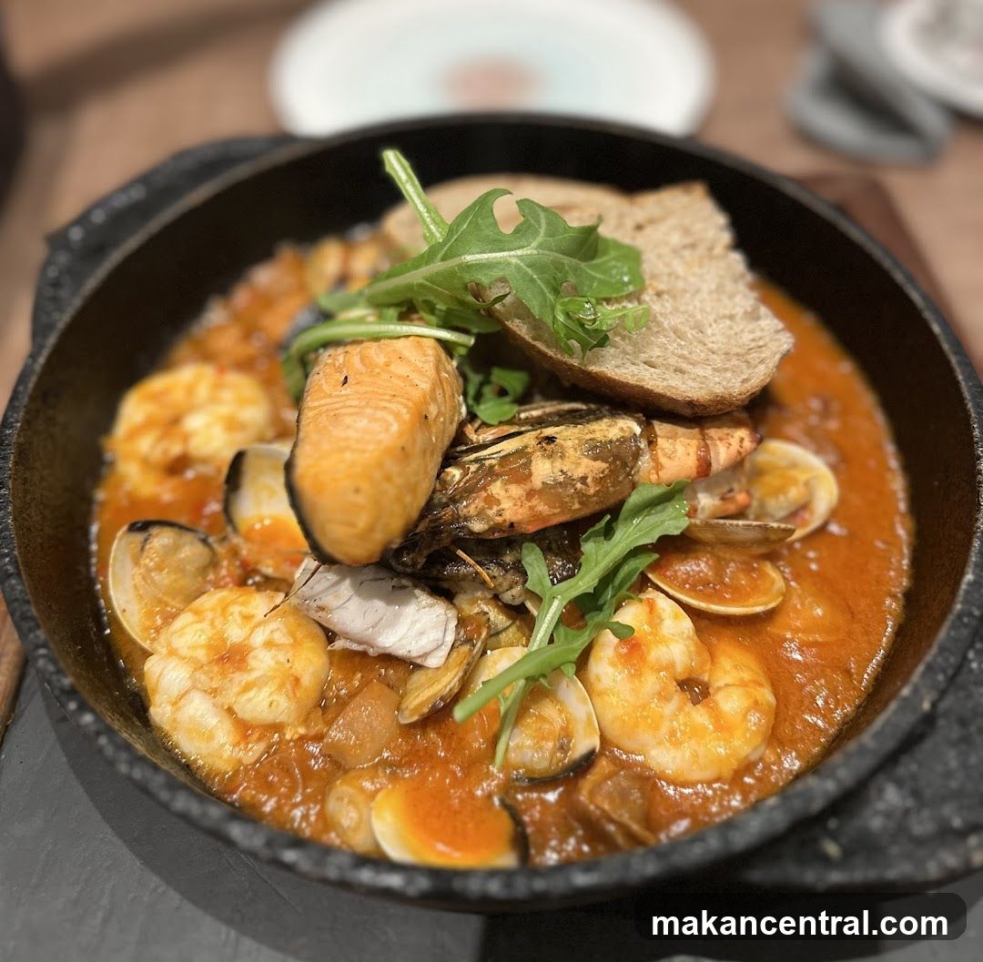 Seafood dish in cast iron pot