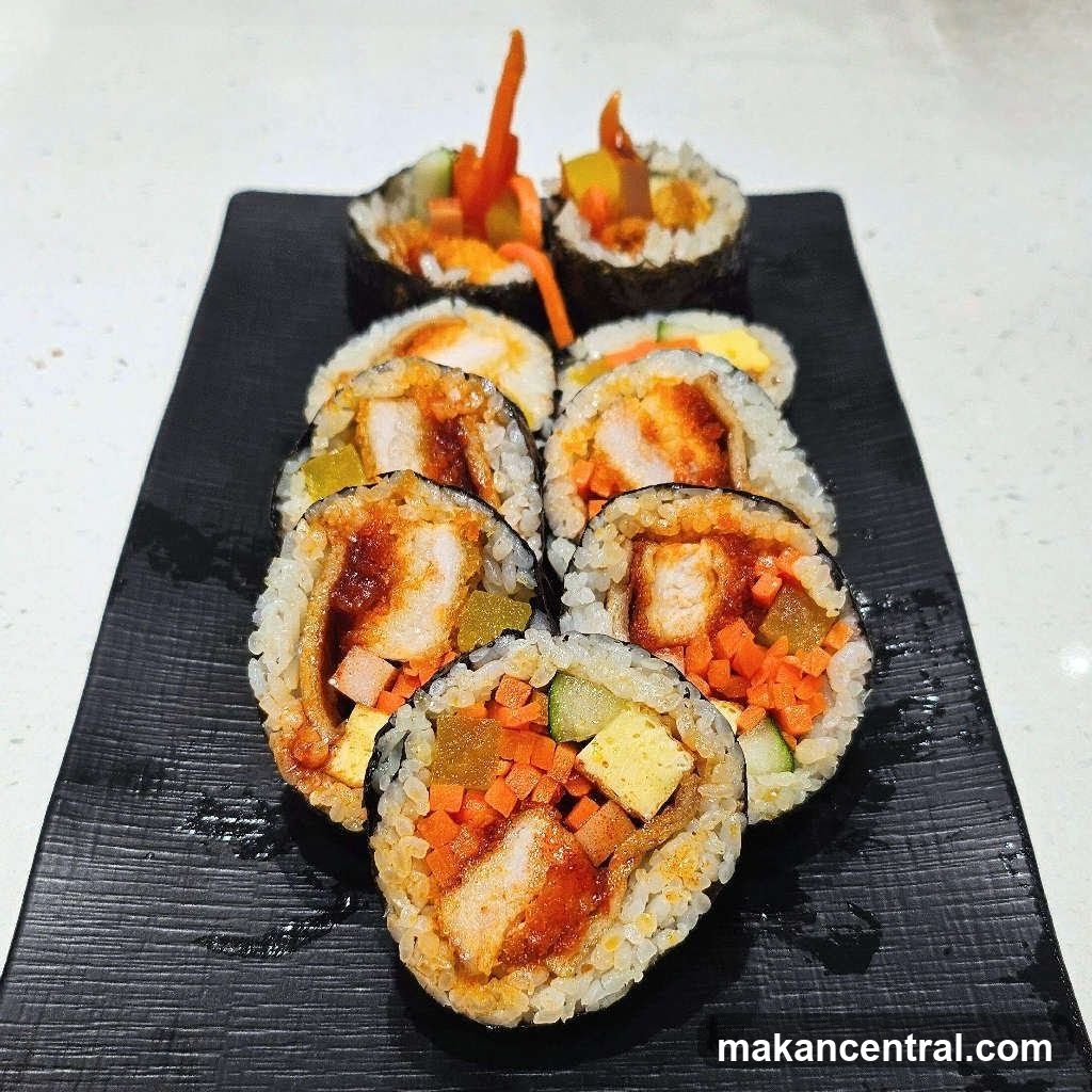 Sushi Rolls on Black Plate