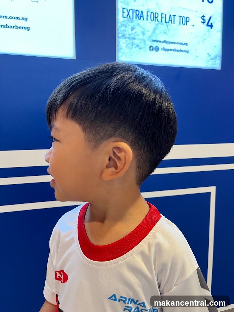 Child in barber shop interior