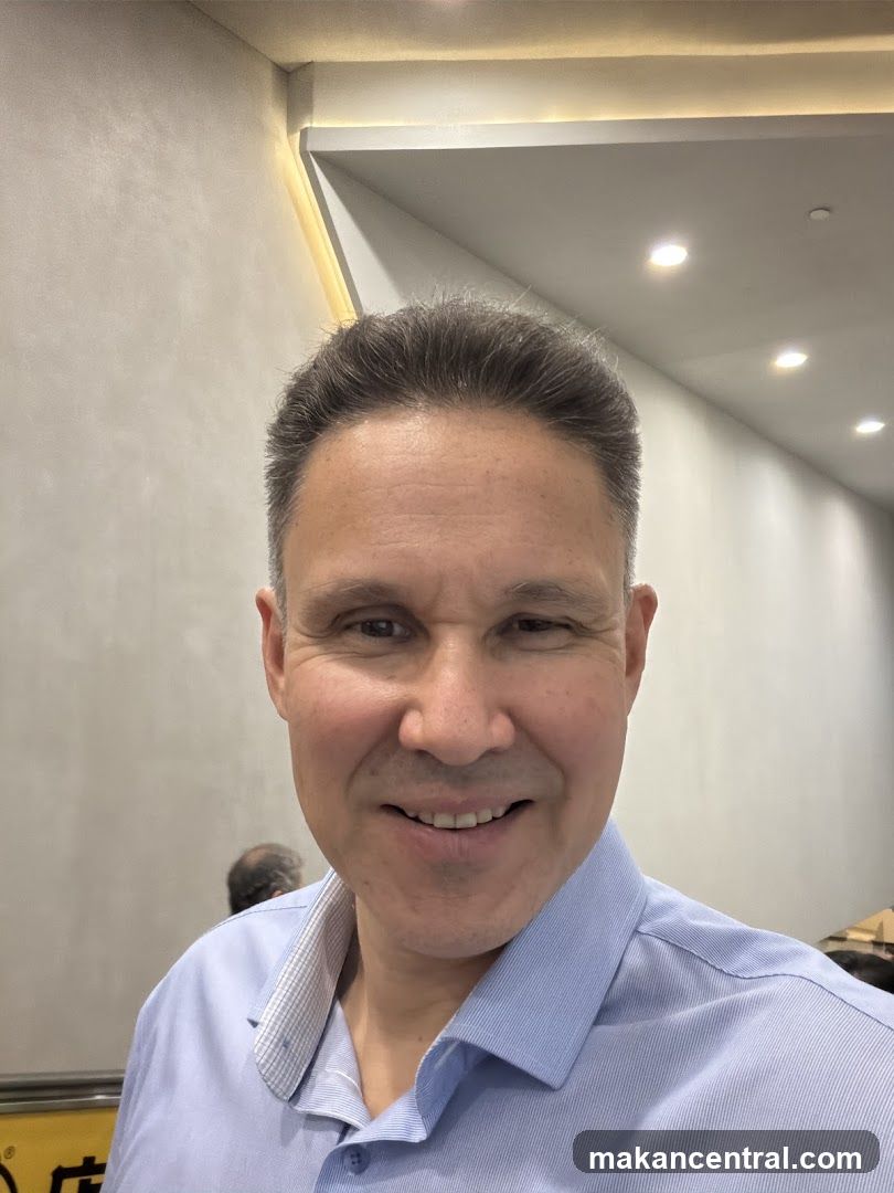 Portrait of a man in an indoor setting