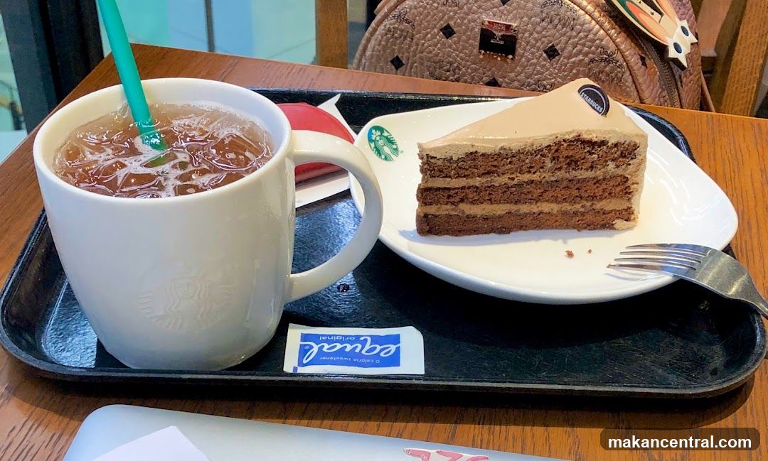 Starbucks beverage and cake