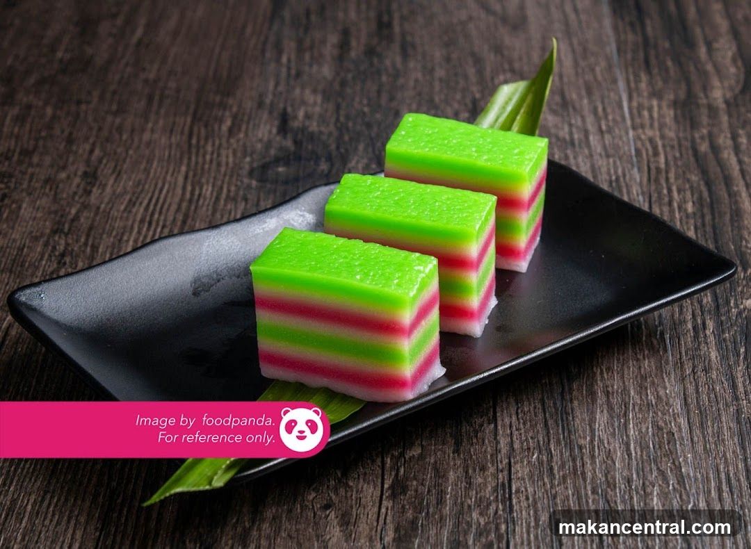 Layered Green and Pink Dessert on Black Plate