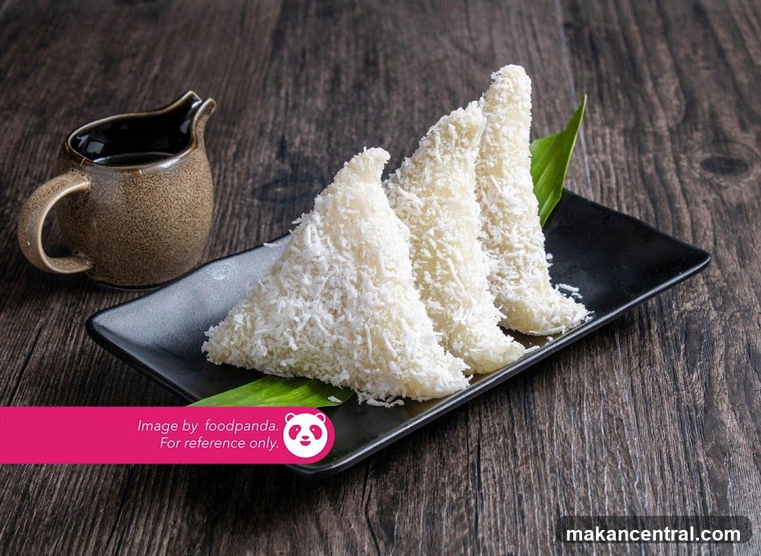 Coconut-covered dessert triangles with dipping sauce
