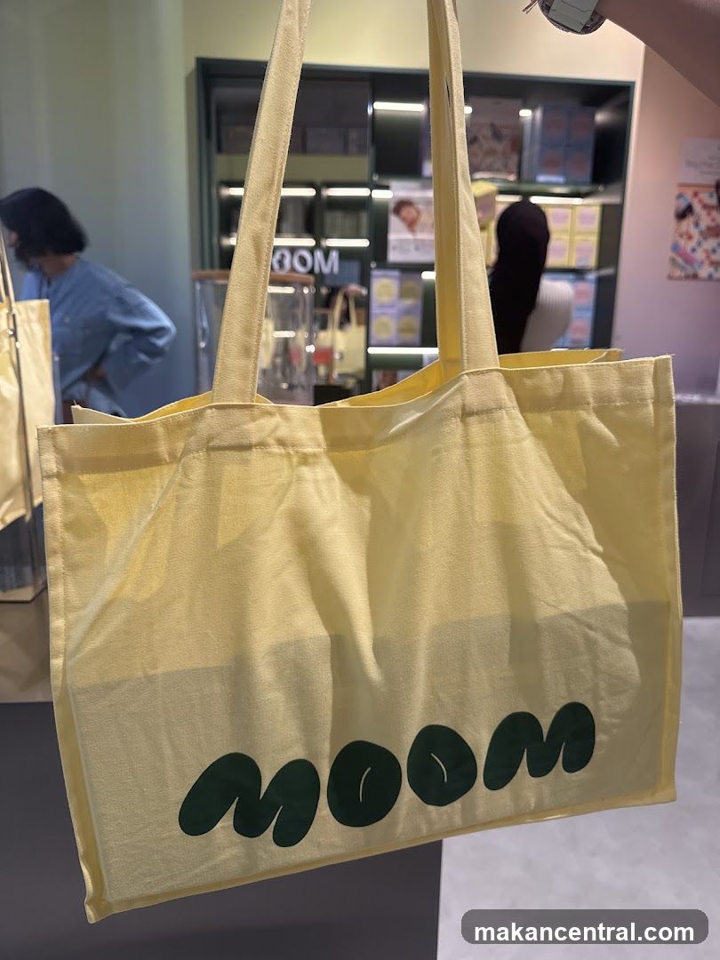 Yellow Tote Bag with "Moom" Logo