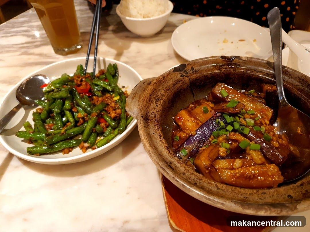 Dishes of Stir-fried Green Beans and Braised Eggplant