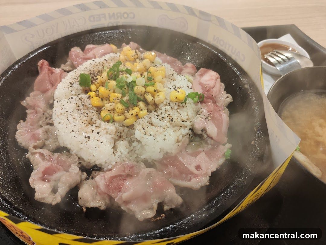 Sizzling Rice Dish with Meat and Corn