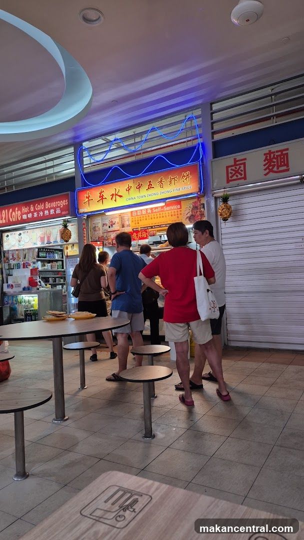 Food court interior with customers and stalls