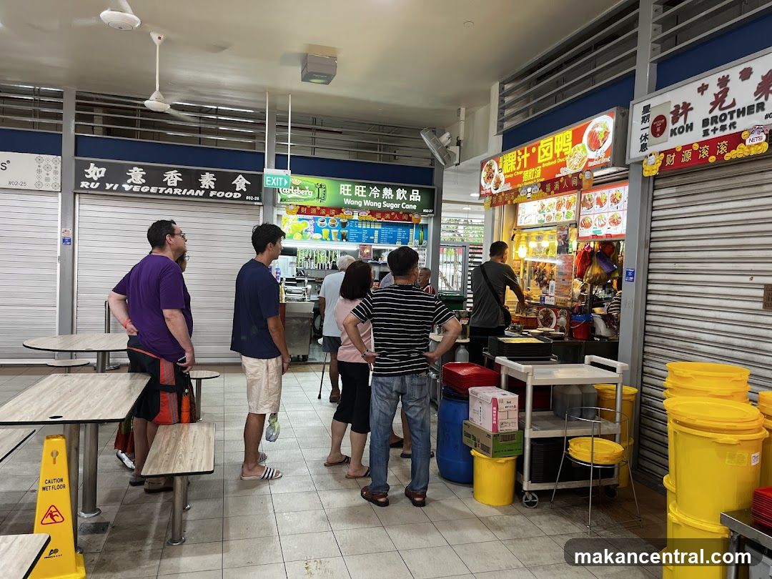 Food court interior with customers and stalls