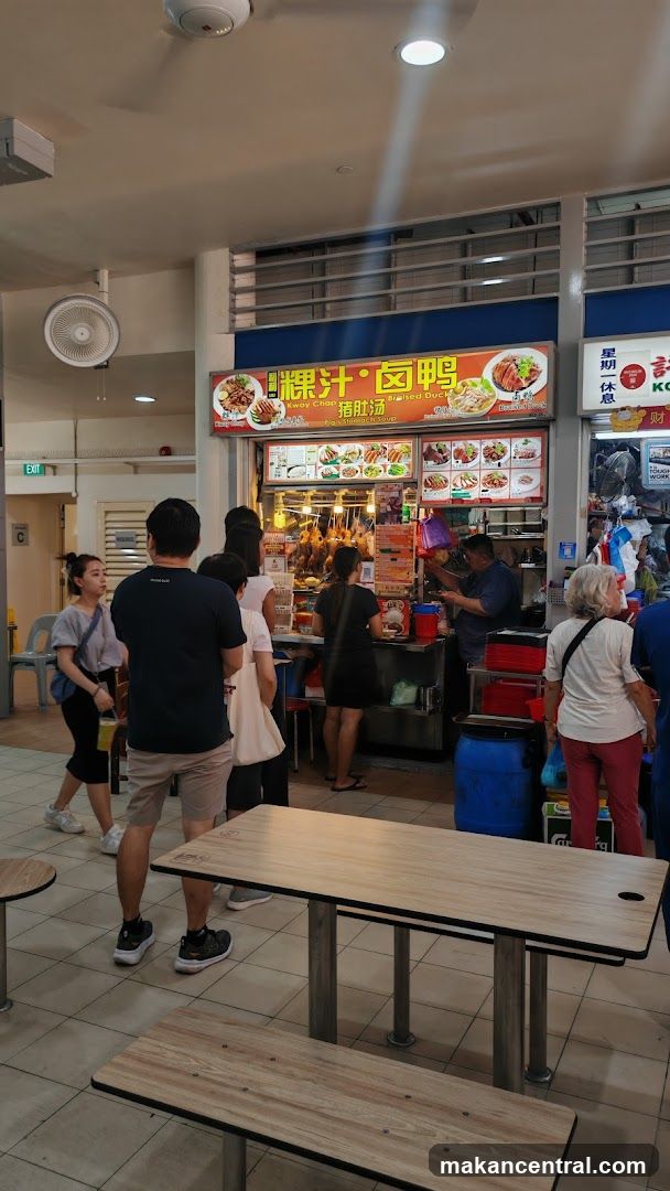 Food court interior with customers and stall
