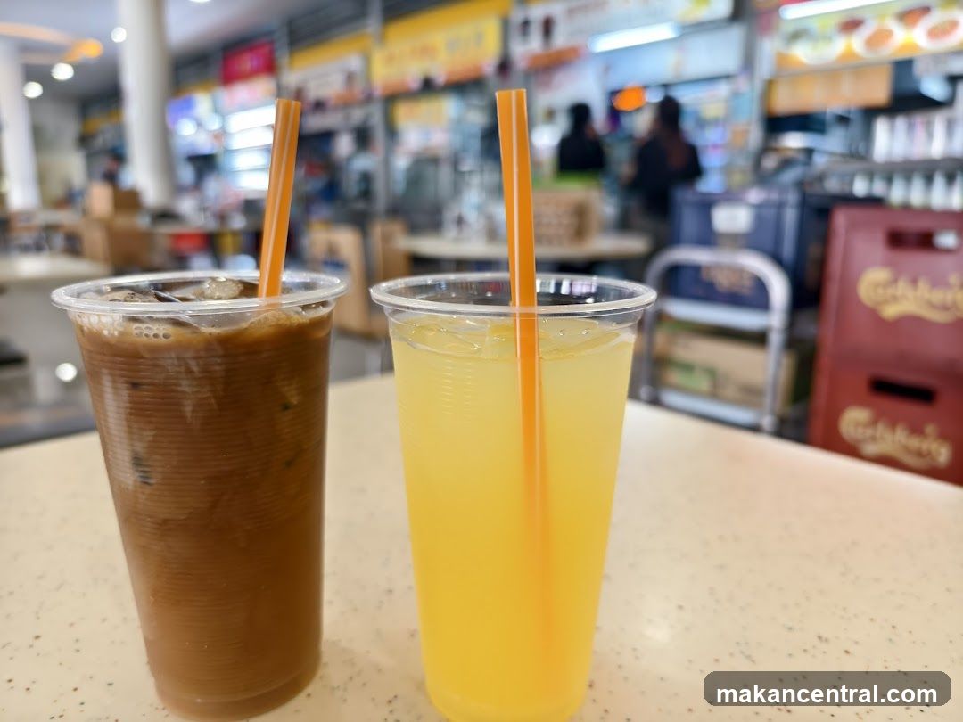 Two beverages on a counter in a food court