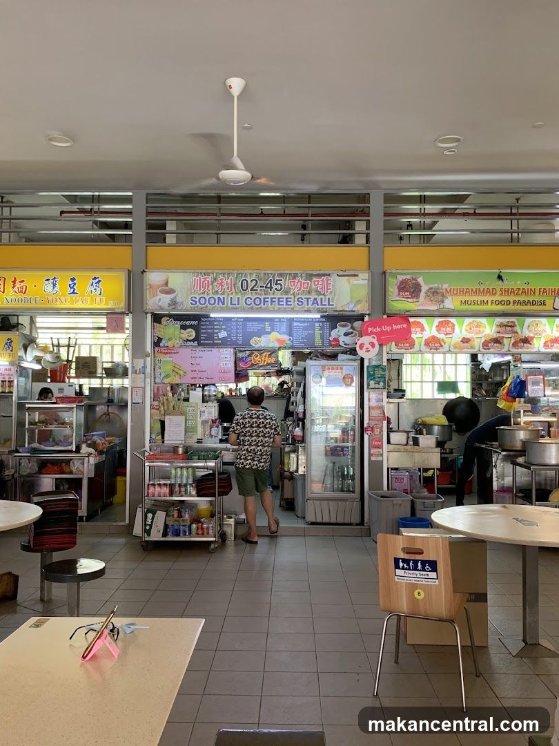 Interior of a hawker center with multiple stalls