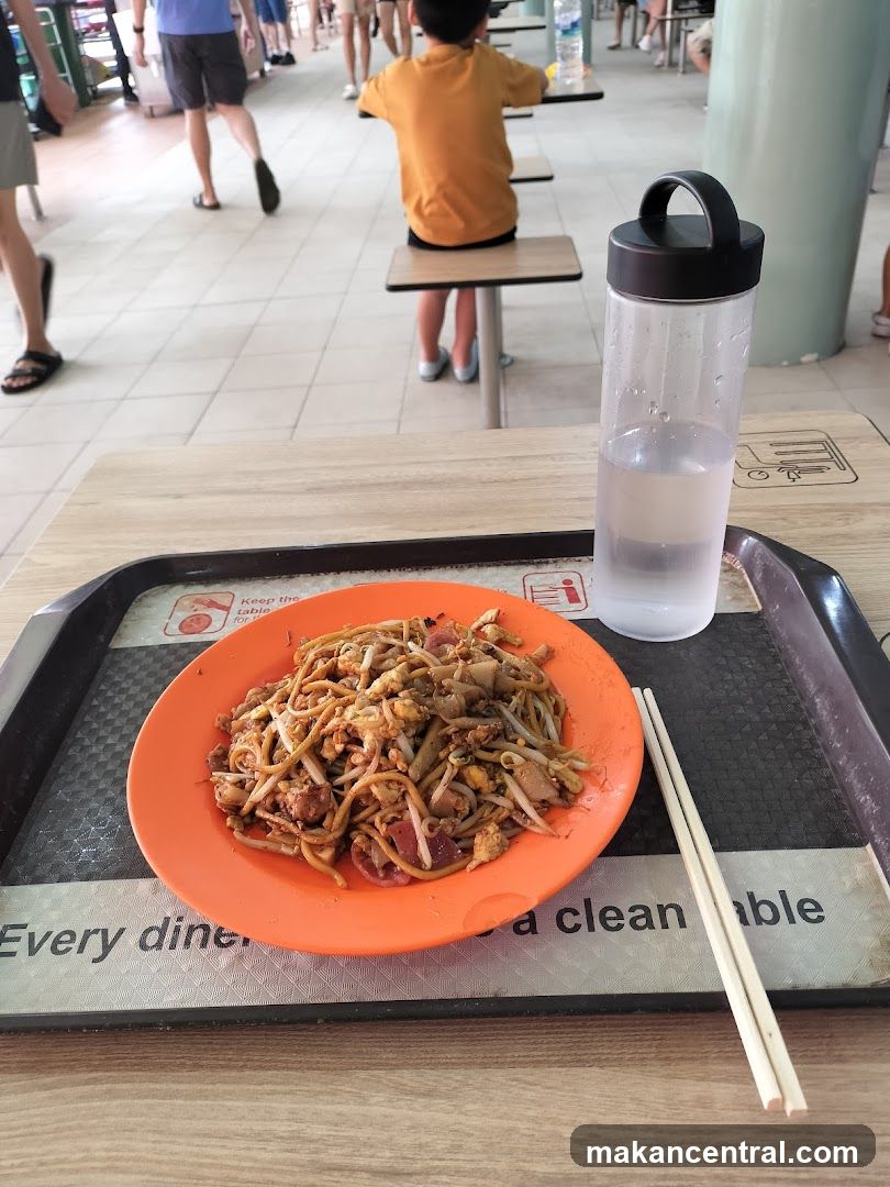Food Tray with Noodles and Water Bottle