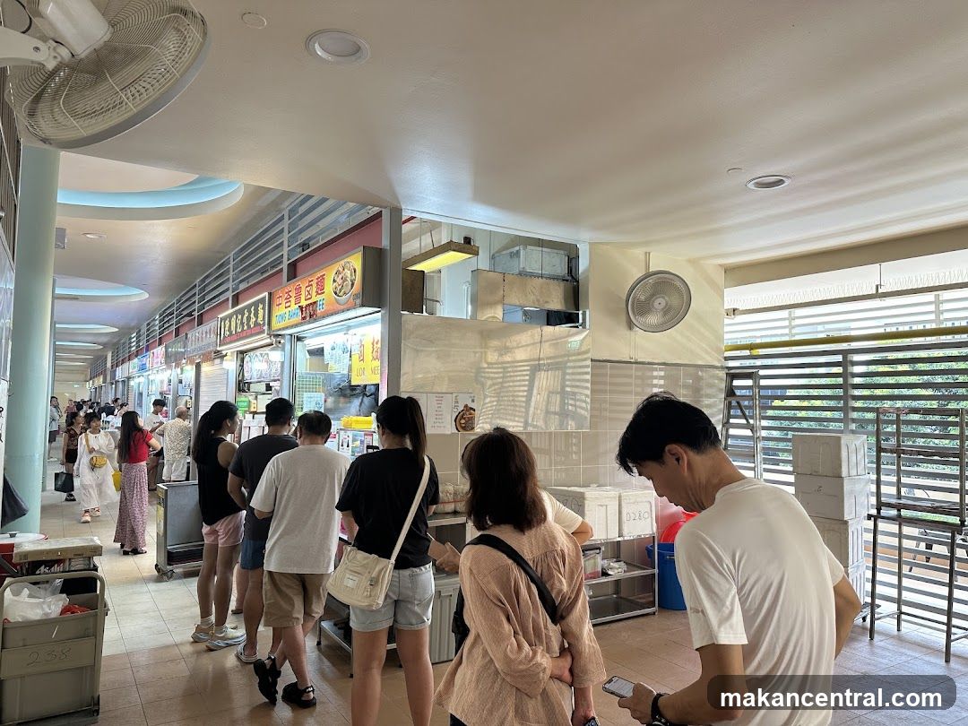 Food stalls with customers queuing
