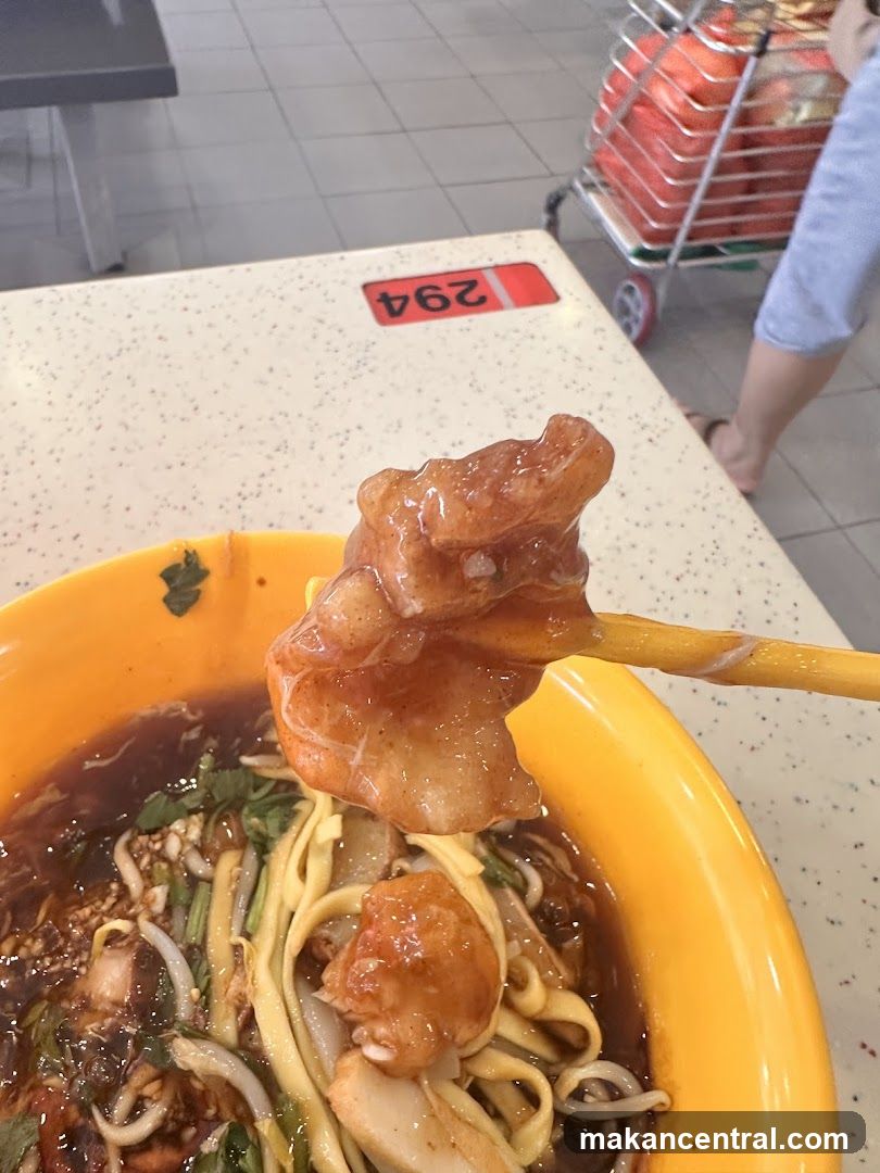 Close-up of a bowl of noodles with meat