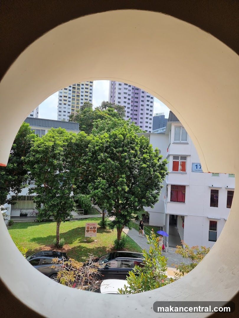 Outdoor scene with apartment buildings and trees