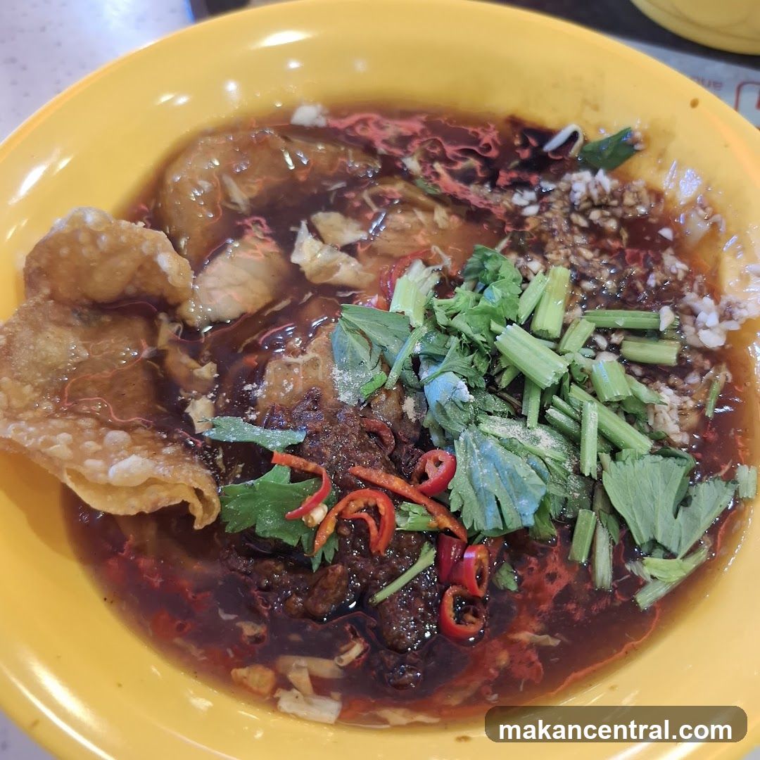 Noodles with Dark Sauce and Toppings
