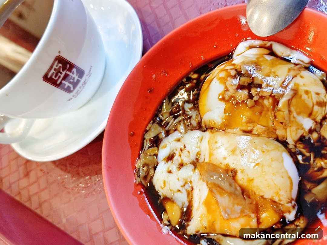 Soft-boiled eggs with soy sauce and coffee