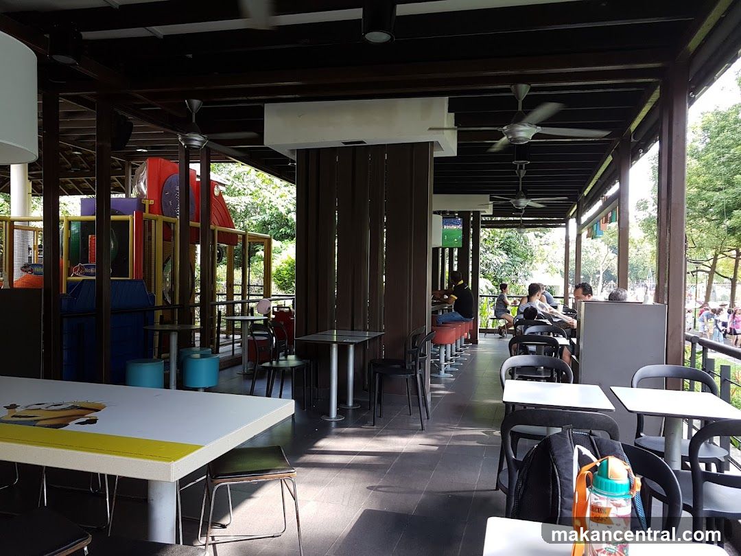 Outdoor dining area with playground