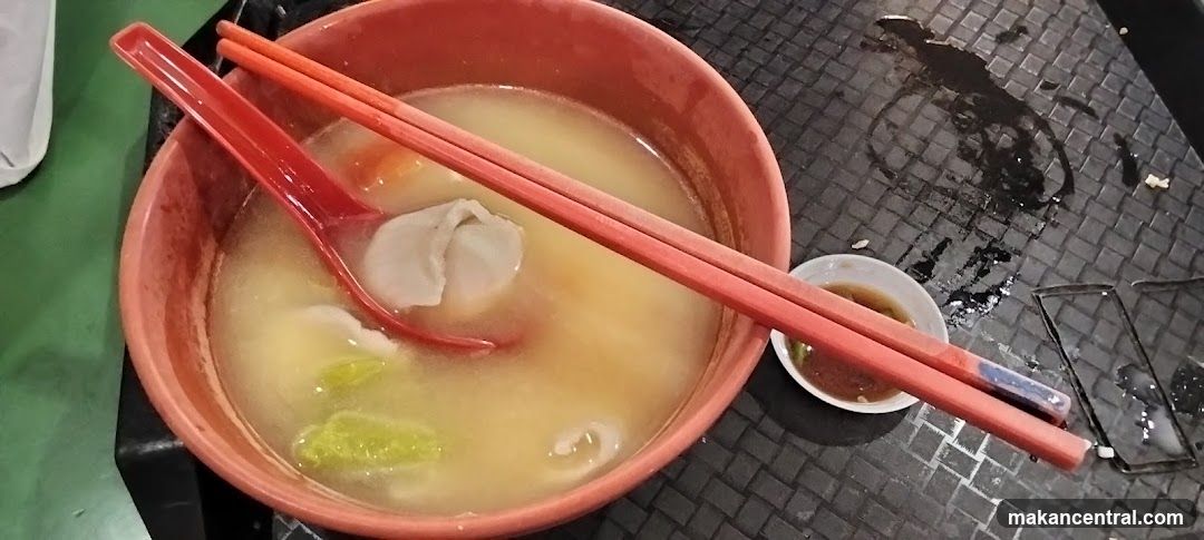 Bowl of Soup with Chopsticks