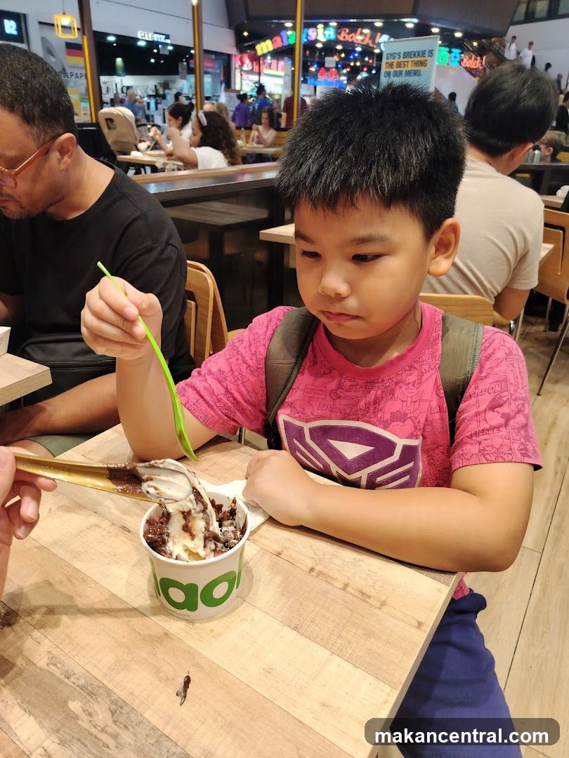 Boy eating dessert
