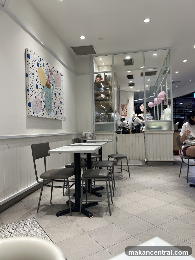 Cafe Interior with Tables and Artwork