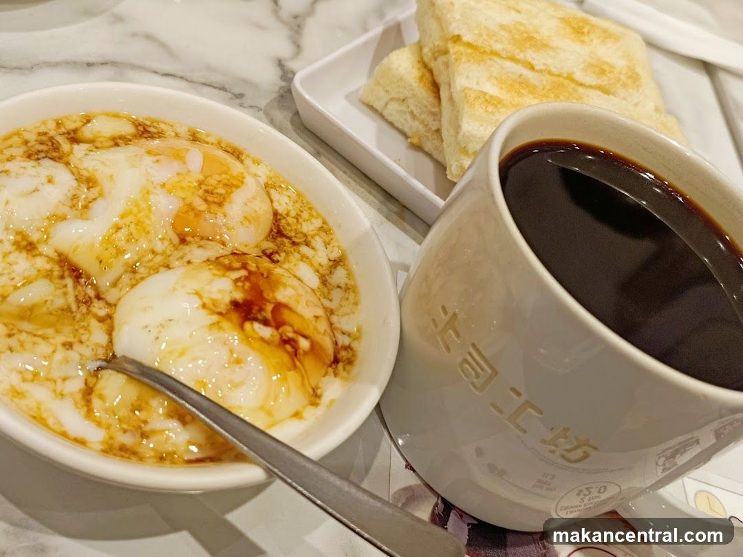 Soft-boiled eggs with toast and coffee