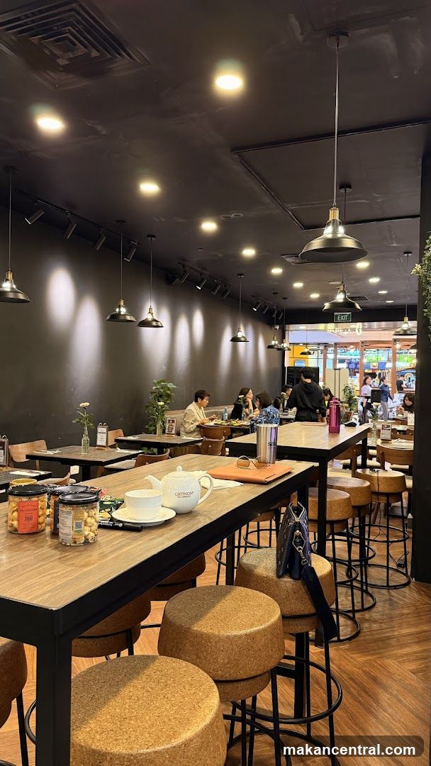 Interior of a cafe with patrons dining