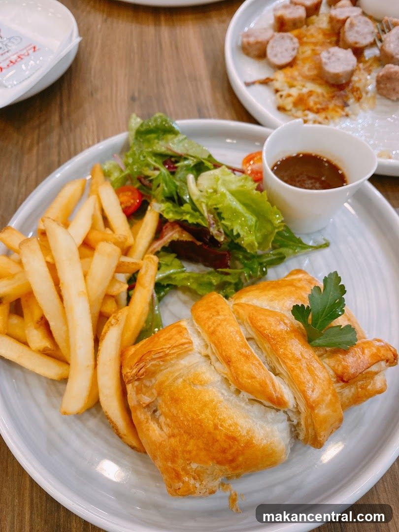 Savory Pastry with Fries and Salad