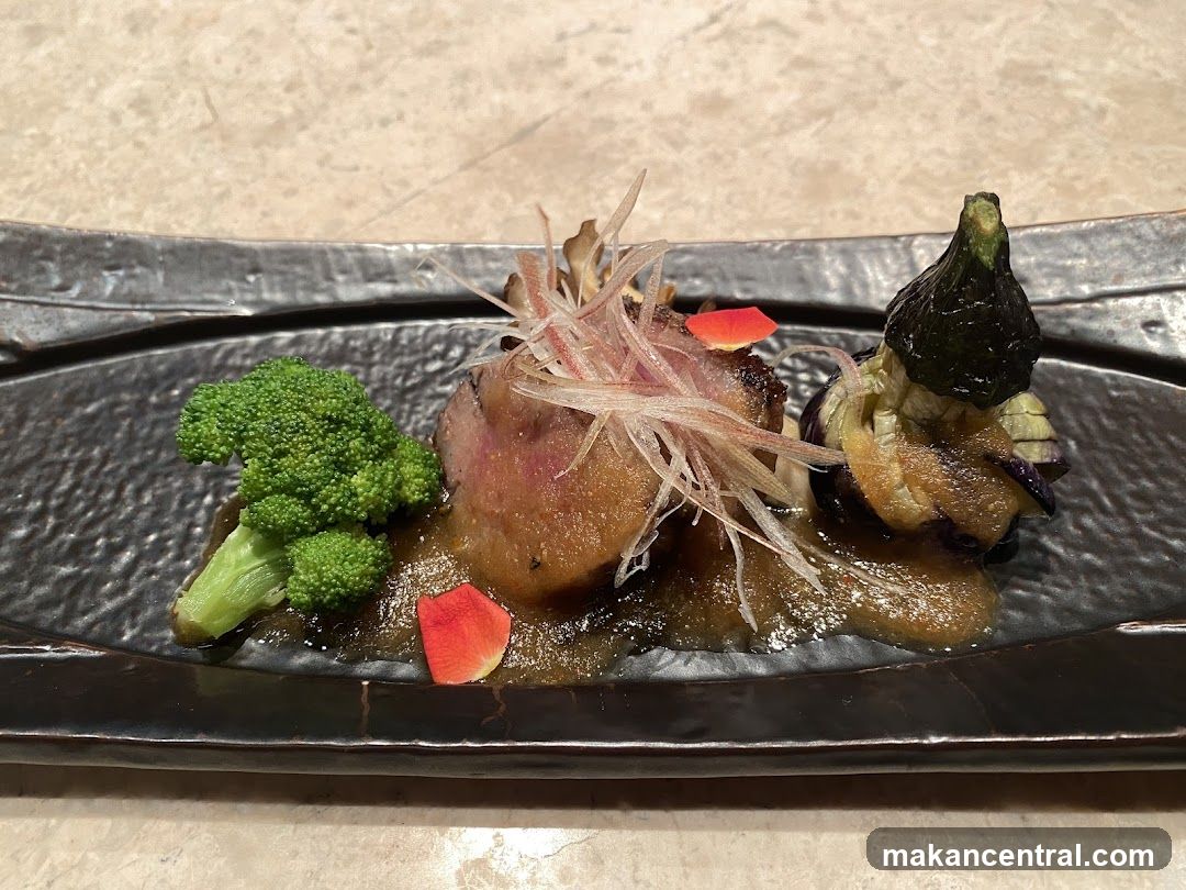 Gourmet Dish with Meat, Broccoli, and Eggplant