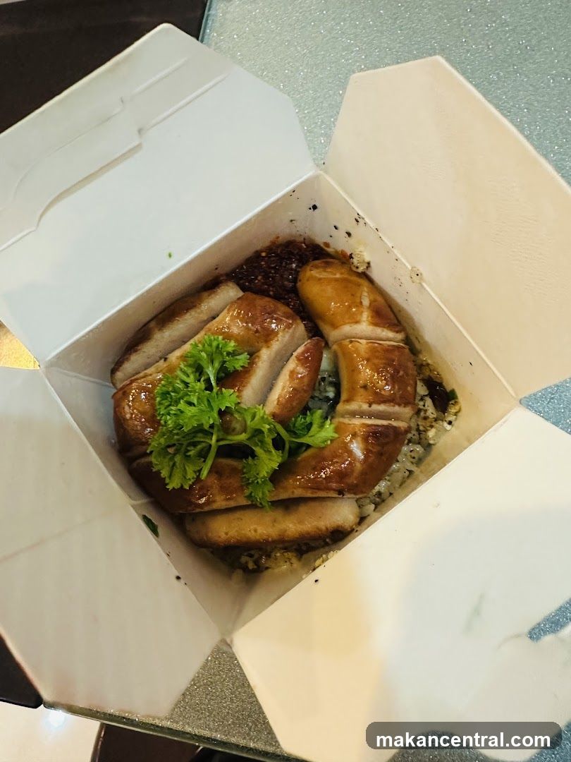 Takeout Box with Sliced Meat and Rice