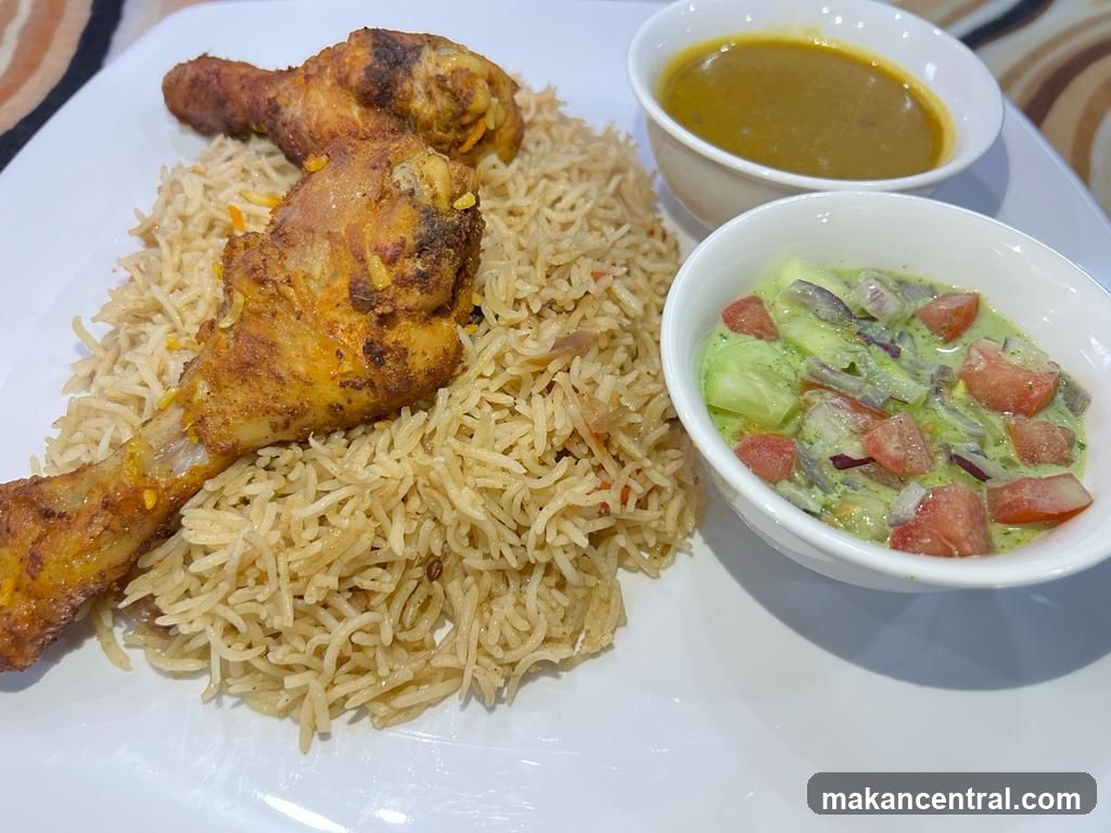 Chicken Biryani with Raita and Dal