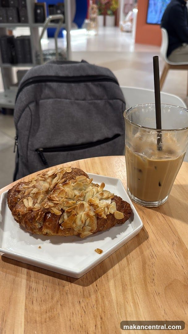 Almond Croissant and Iced Coffee